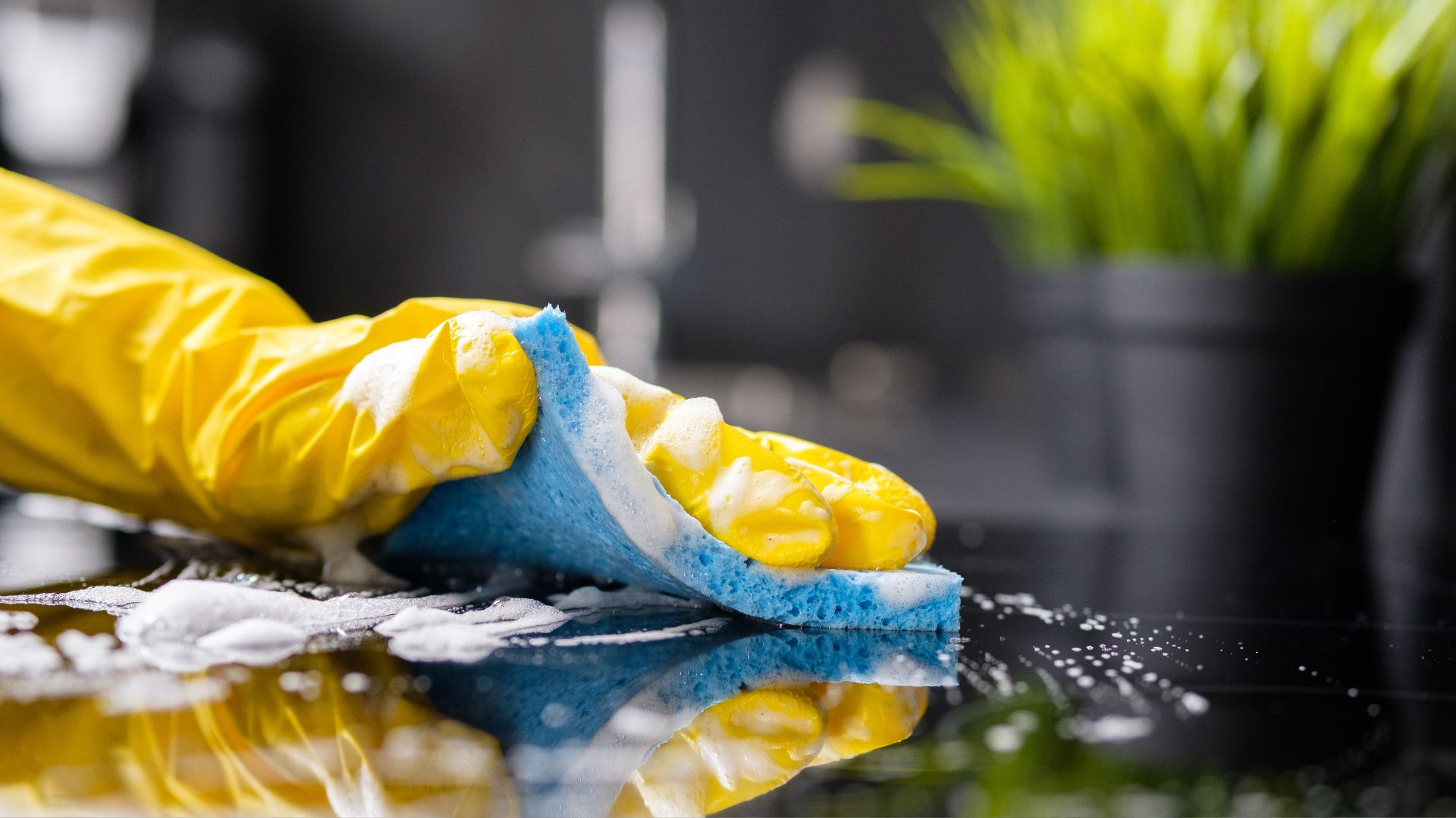 A pair of yellow and blue shoes on a table