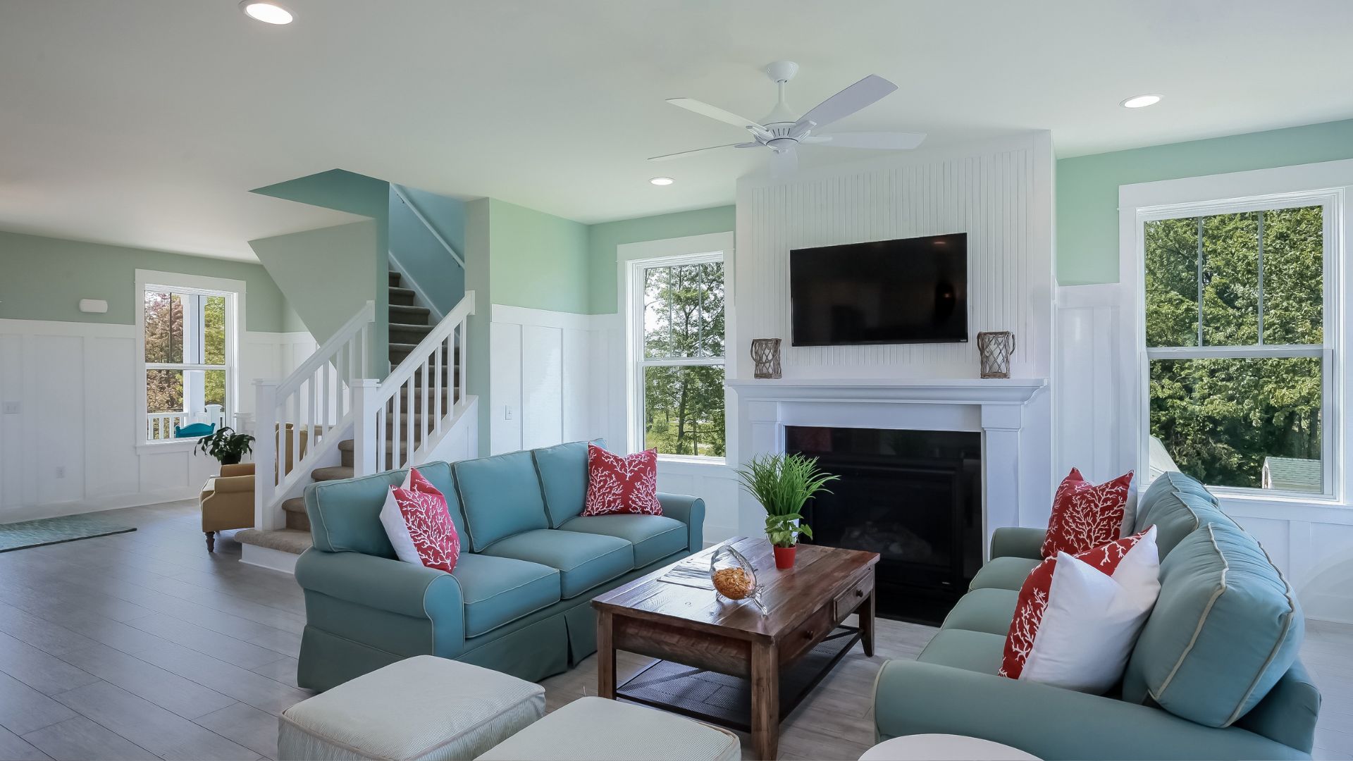 A living room filled with furniture and a flat screen tv